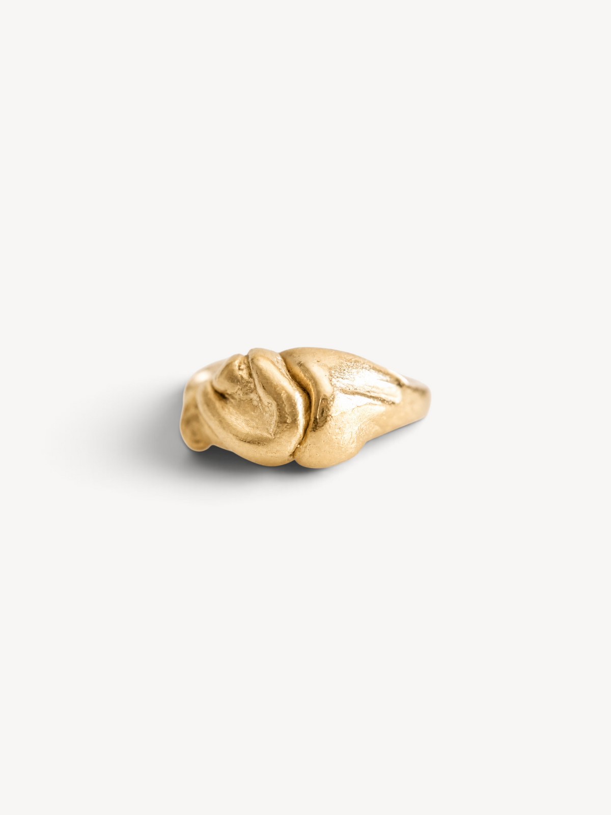 Top view of a handcrafted 14k gold-plated sterling silver ring with an organic contemporary form.