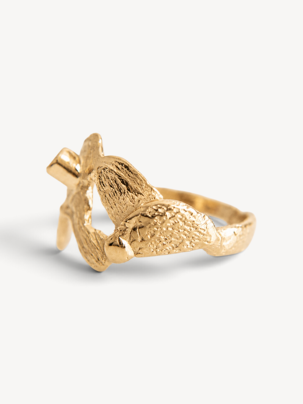 Rear angle of a handcrafted 14k gold-plated sterling silver ring showcasing its sculptural floral-inspired form and handcrafted texture.