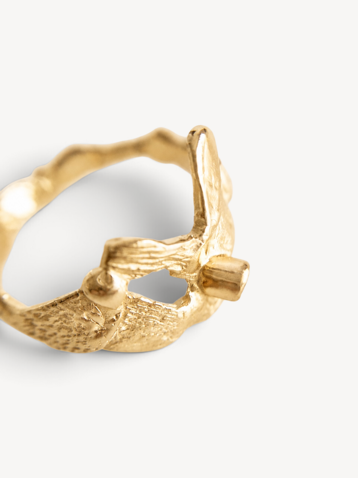 Underside view of a handcrafted 14k gold-plated sterling silver ring highlighting its open sculptural construction and artisan craftsmanship.