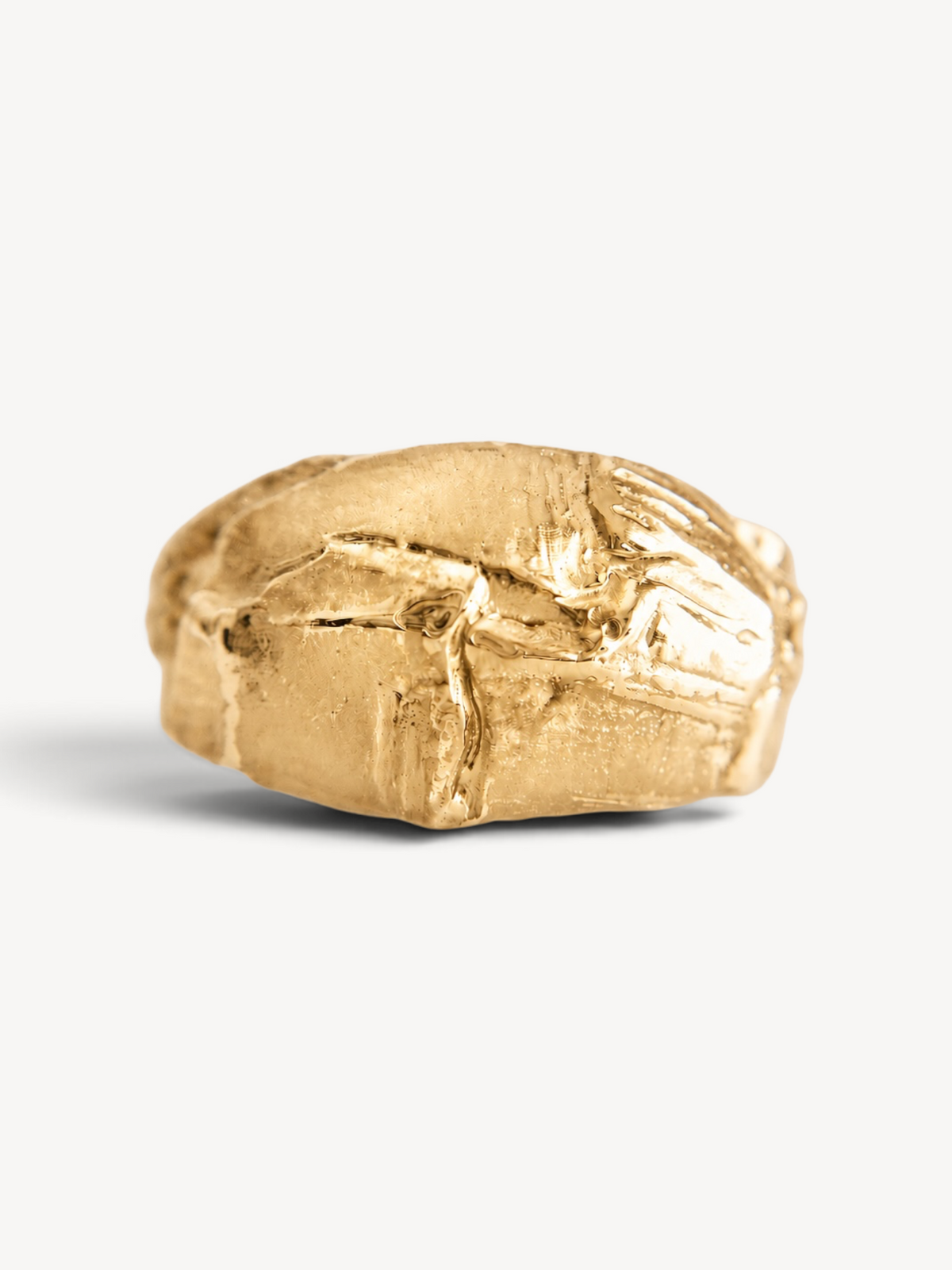 Back view of a handcrafted 14k gold-plated sterling silver ring highlighting its organic sculptural texture and artisanal craftsmanship.